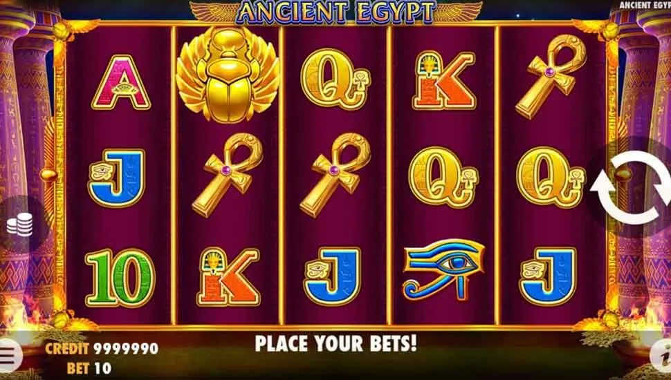 Ancient Egypt base game reels with the golden scarab wild landing on the second reel