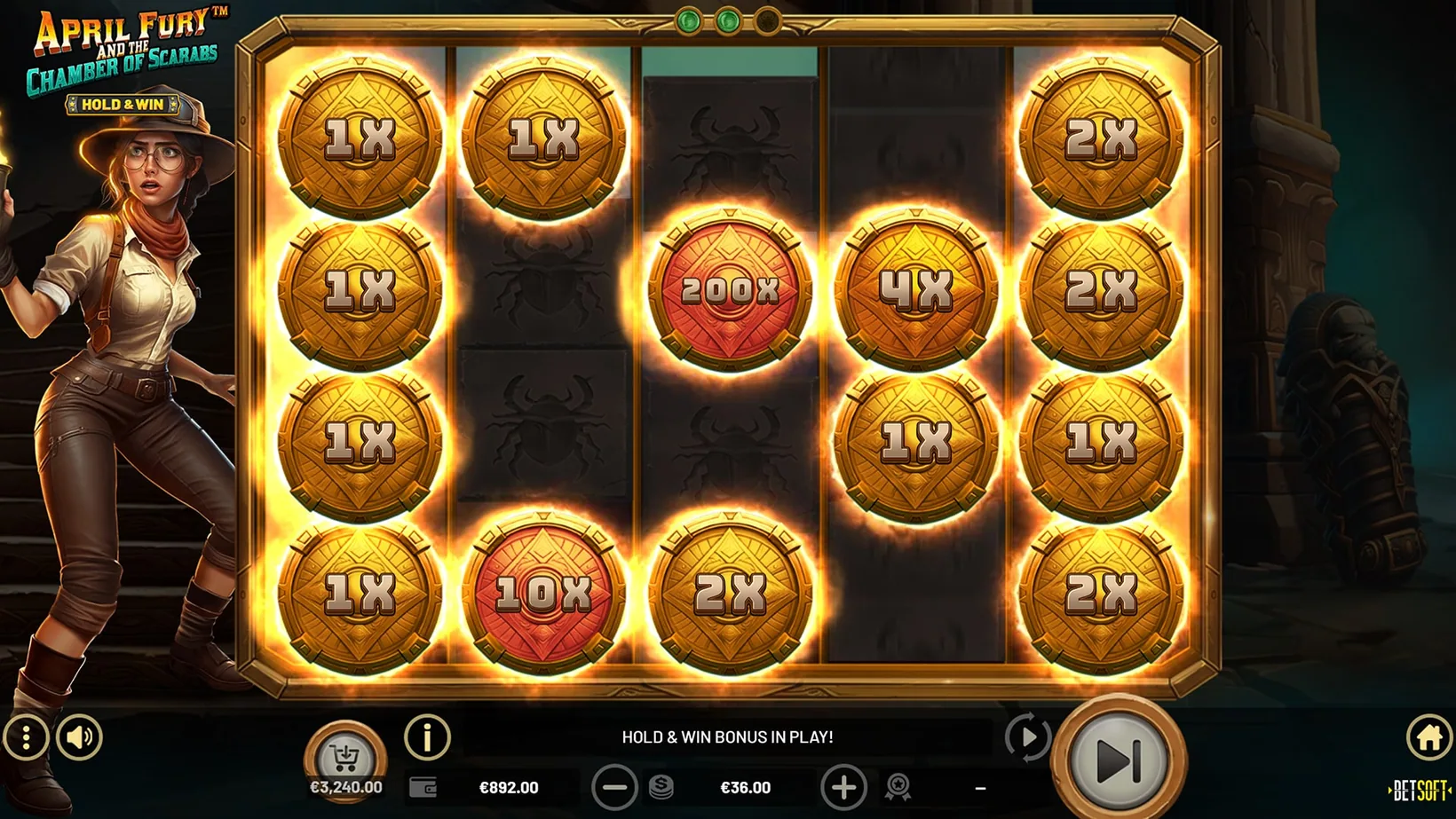 Locked gold scarab coins carrying multipliers during the Hold and Win round