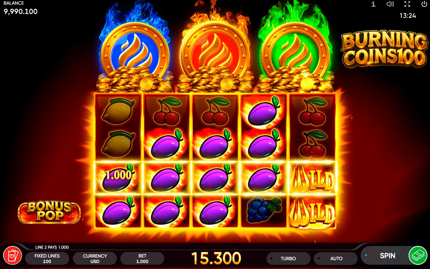 Burning Coins 100 base game with three flaming coins above the reels and stacked wilds paying a line of plums